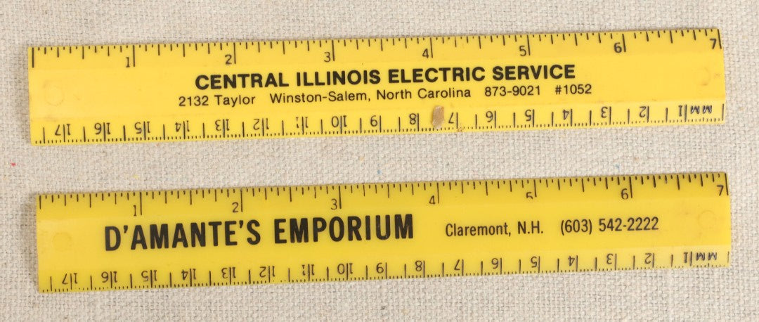 Lot 063 - Grouping Of 11 Vintage Advertising Wood And Plastic Rulers Including Edgar J. Martel Optometrist With Eye Graphics, Brown & Saltmarsh, Victor Phosphate Baking Powder, And More