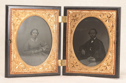 Lot 067 - Pair Of Antique 1/4th Plate Ambrotype Photographs, Married Couple, In Double Thermoplastic Union Case By S. Peck & Co. With Scroll And Medallion Design