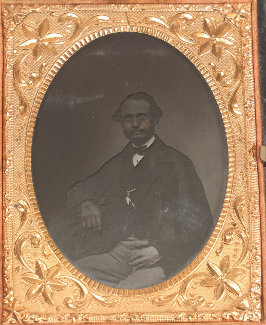 Lot 067 - Pair Of Antique 1/4th Plate Ambrotype Photographs, Married Couple, In Double Thermoplastic Union Case By S. Peck & Co. With Scroll And Medallion Design