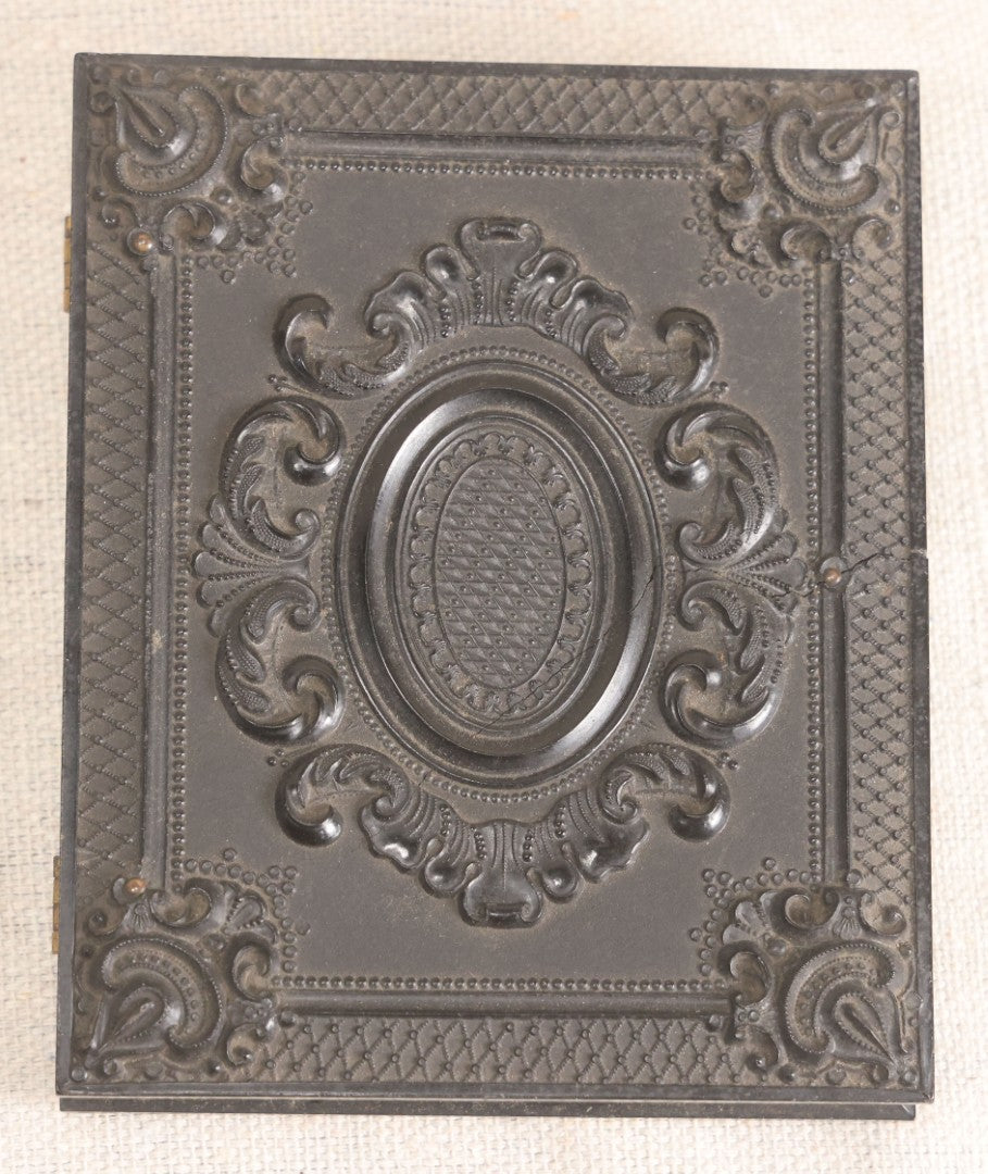 Lot 067 - Pair Of Antique 1/4th Plate Ambrotype Photographs, Married Couple, In Double Thermoplastic Union Case By S. Peck & Co. With Scroll And Medallion Design