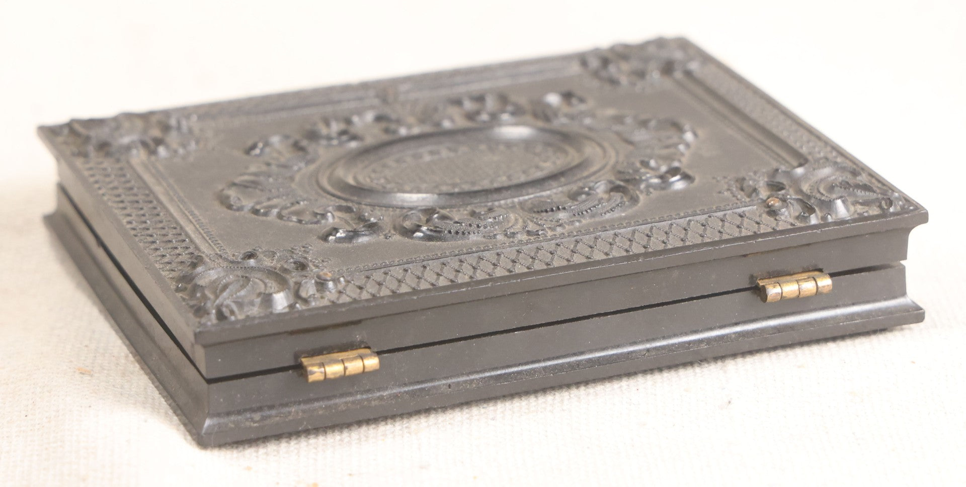 Lot 067 - Pair Of Antique 1/4th Plate Ambrotype Photographs, Married Couple, In Double Thermoplastic Union Case By S. Peck & Co. With Scroll And Medallion Design