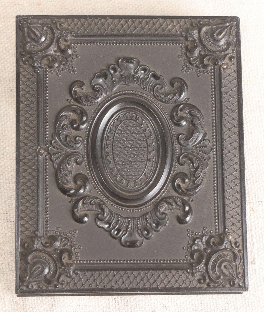 Lot 067 - Pair Of Antique 1/4th Plate Ambrotype Photographs, Married Couple, In Double Thermoplastic Union Case By S. Peck & Co. With Scroll And Medallion Design