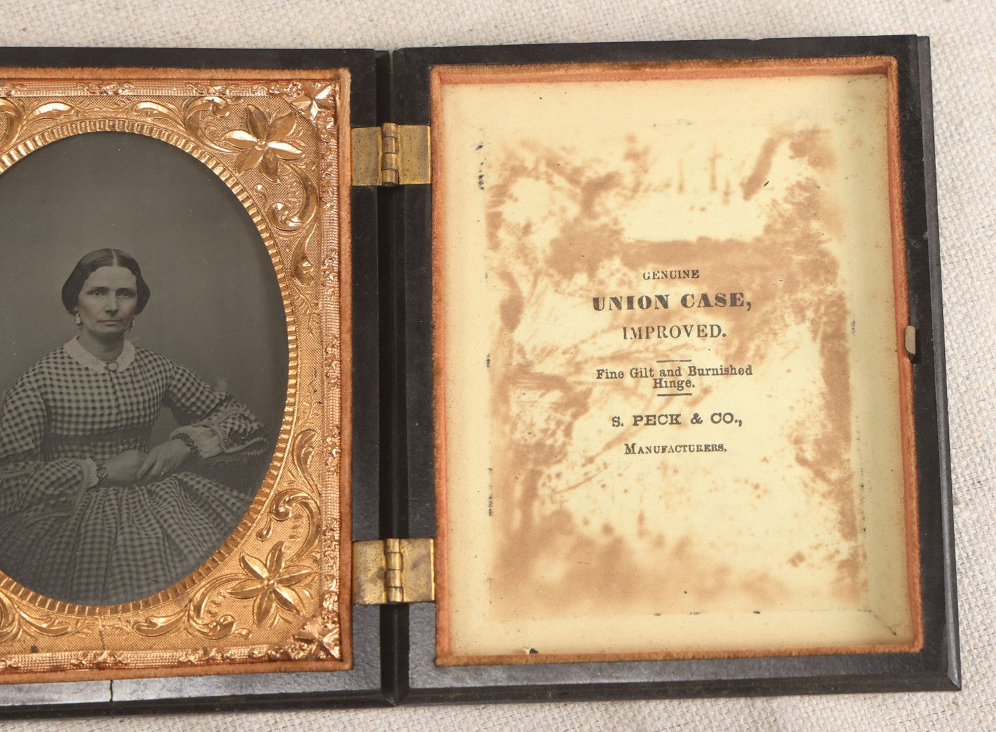 Lot 067 - Pair Of Antique 1/4th Plate Ambrotype Photographs, Married Couple, In Double Thermoplastic Union Case By S. Peck & Co. With Scroll And Medallion Design