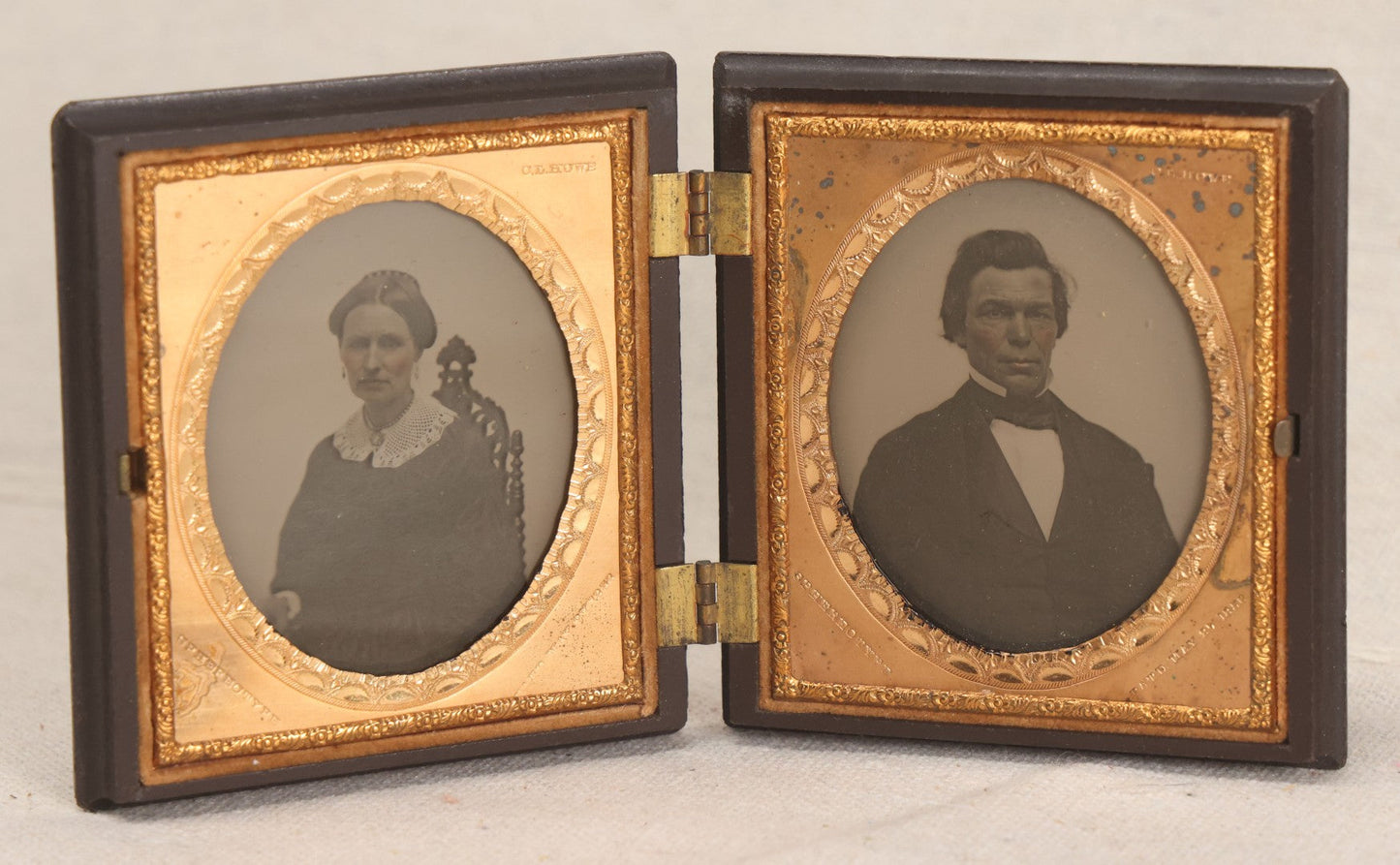 Lot 068 - Pair Of Antique 1/6th Plate Spherotype Ambrotype Photographs By C.L. Howe, Married Couple, In Double Thermoplastic Union Case By A.P. Critchlow & Co.