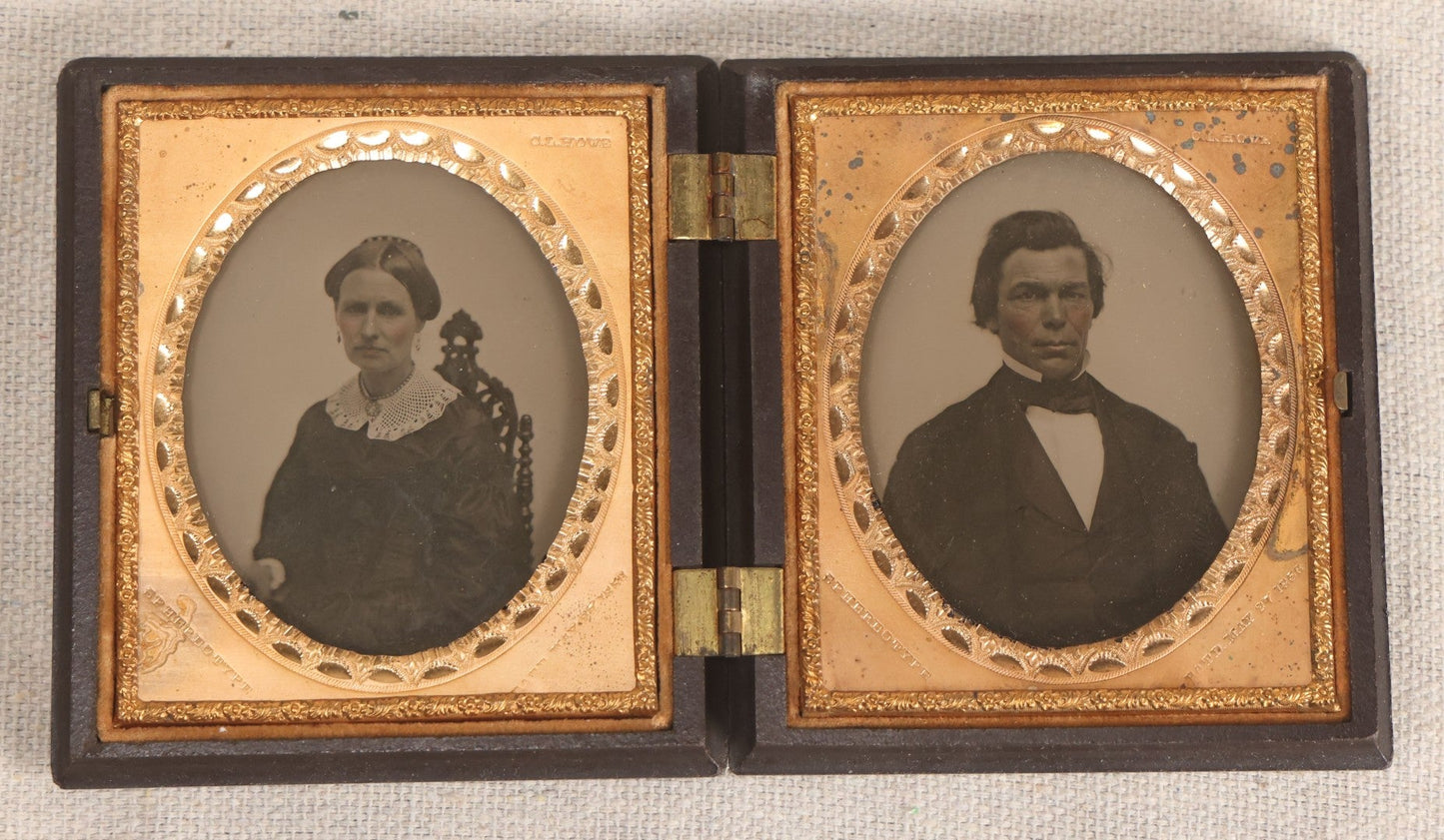 Lot 068 - Pair Of Antique 1/6th Plate Spherotype Ambrotype Photographs By C.L. Howe, Married Couple, In Double Thermoplastic Union Case By A.P. Critchlow & Co.