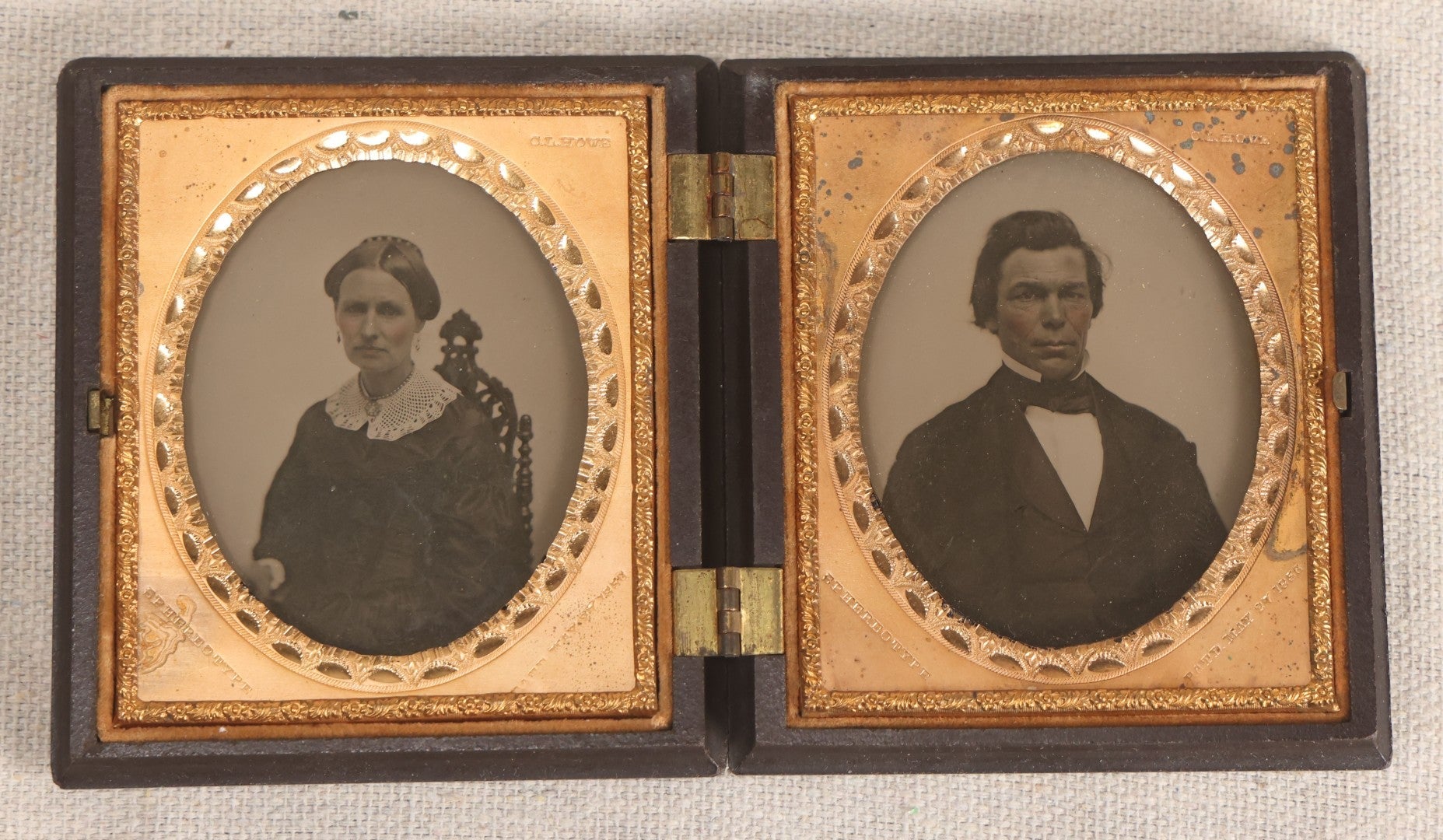 Lot 068 - Pair Of Antique 1/6th Plate Spherotype Ambrotype Photographs By C.L. Howe, Married Couple, In Double Thermoplastic Union Case By A.P. Critchlow & Co.