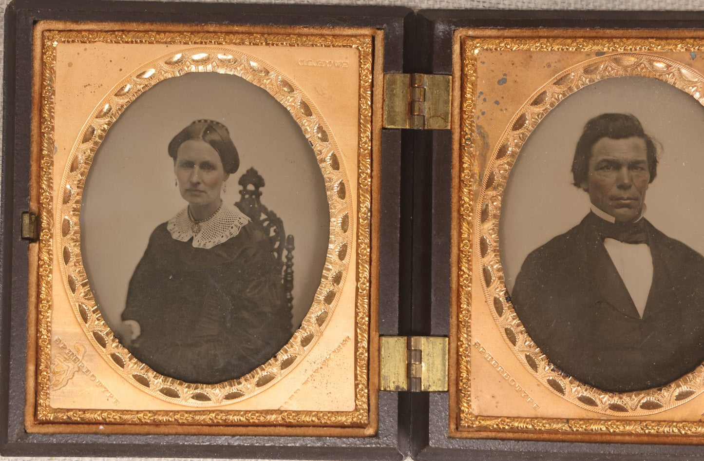 Lot 068 - Pair Of Antique 1/6th Plate Spherotype Ambrotype Photographs By C.L. Howe, Married Couple, In Double Thermoplastic Union Case By A.P. Critchlow & Co.