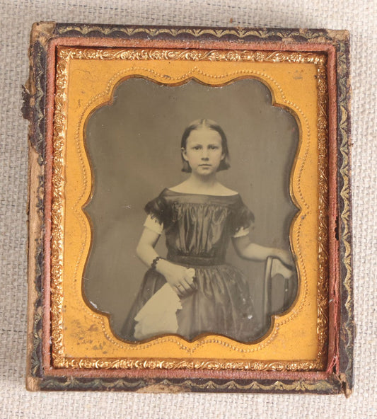 Lot 070 - Antique 1/6th Plate Ambrotype Photograph, Portrait Of A Young Girl In Off-Shoulder Dress, In Half Leatherette Case
