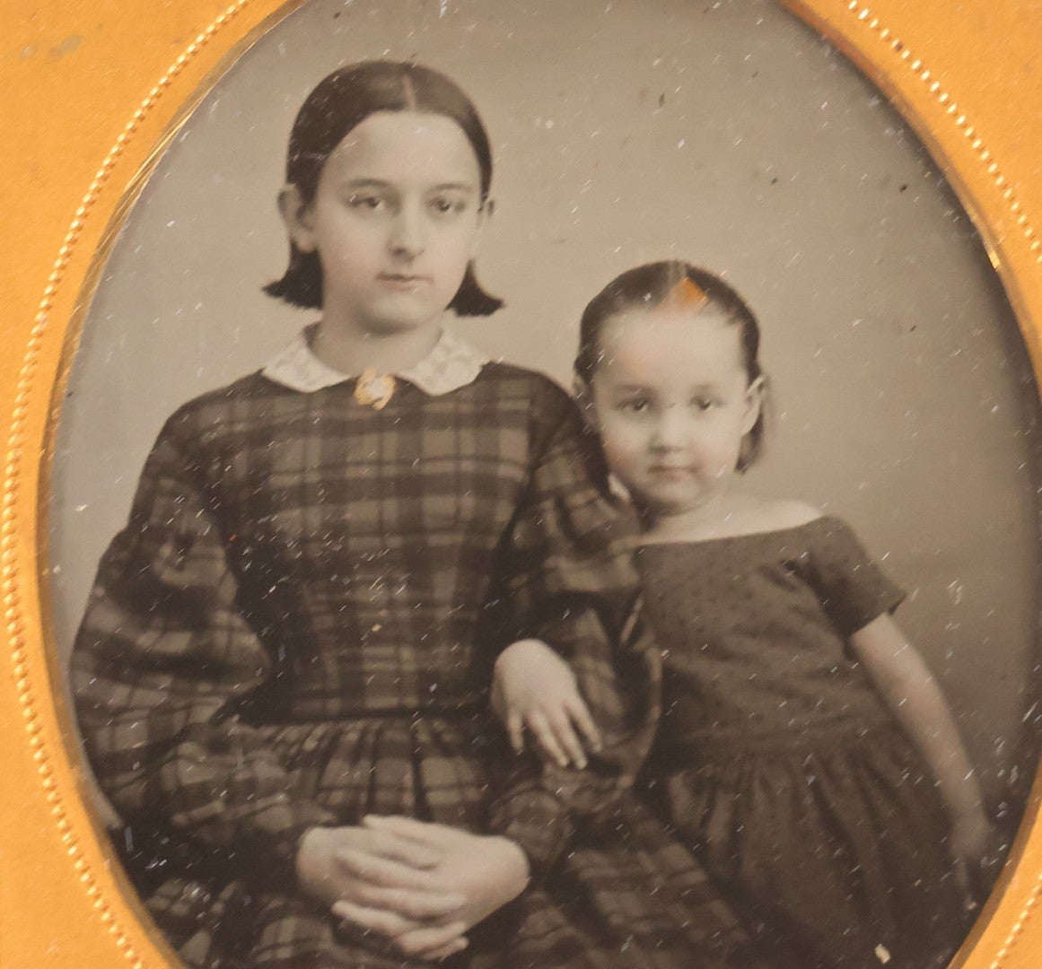Lot 072 - Antique 1/6th Plate Ambrotype Photograph, Identified Sisters Juliet B. Cook And Anna Fassett Cook Goodman In Plaid Dresses, In Full Split Leatherette Case