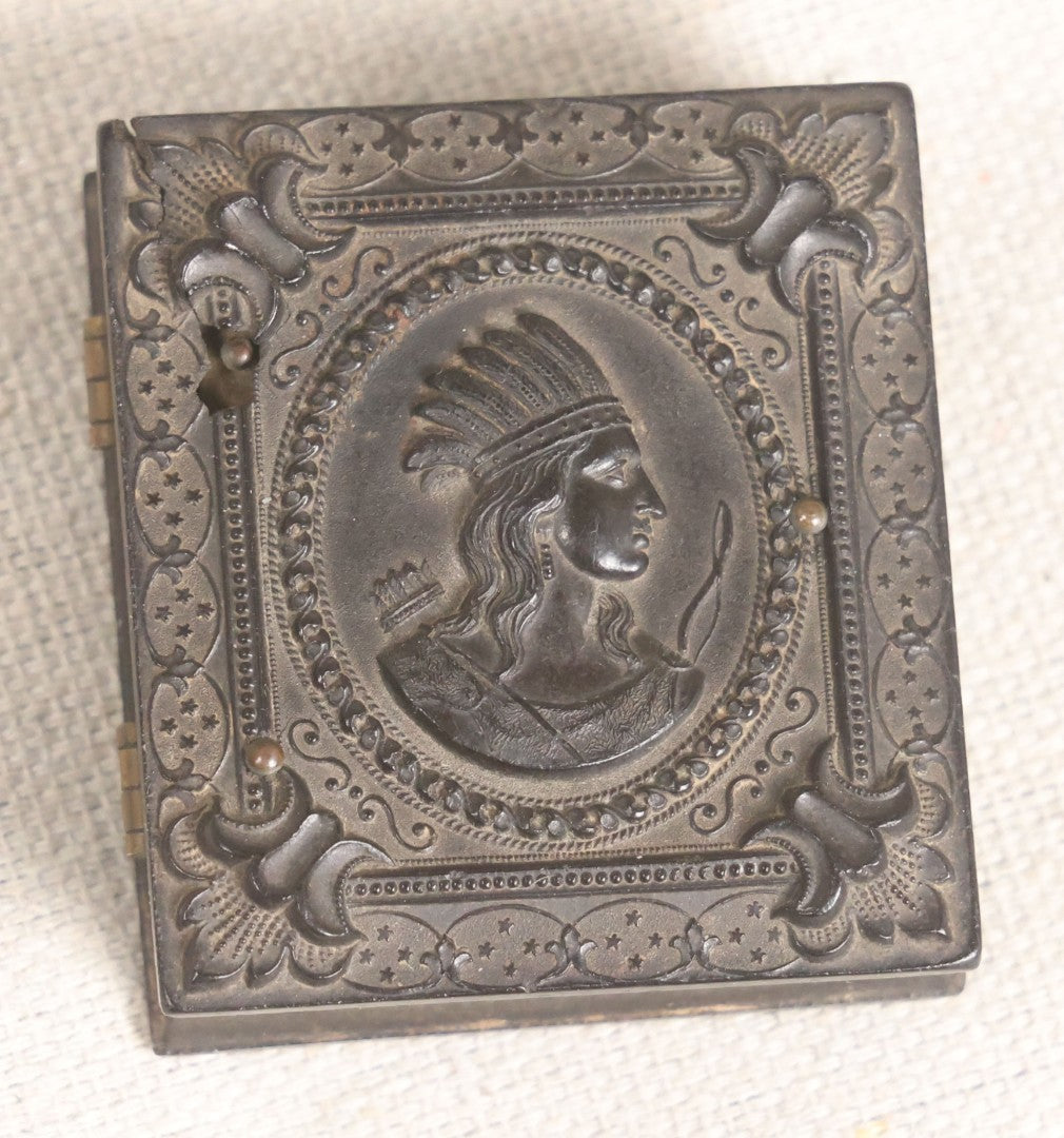 Lot 076 - Antique Thermoplastic Union Case With Native American Profile Bust And Star Border Design, Containing A 1/6th Plate Ambrotype Photograph Of A Young Man, Holmes, Booth & Haydens Label