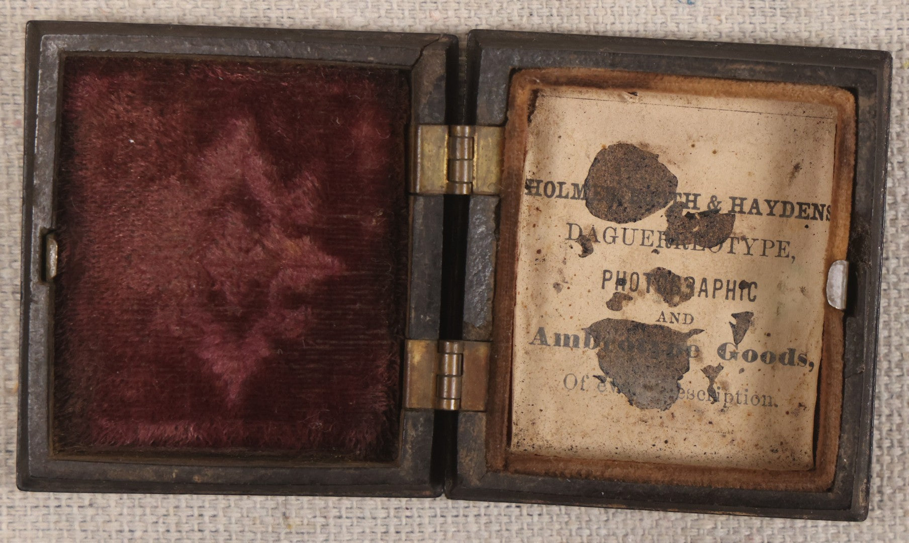 Lot 076 - Antique Thermoplastic Union Case With Native American Profile Bust And Star Border Design, Containing A 1/6th Plate Ambrotype Photograph Of A Young Man, Holmes, Booth & Haydens Label