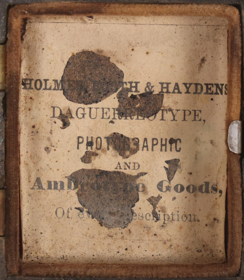 Lot 076 - Antique Thermoplastic Union Case With Native American Profile Bust And Star Border Design, Containing A 1/6th Plate Ambrotype Photograph Of A Young Man, Holmes, Booth & Haydens Label