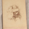 Lot 088 - Antique Cabinet Card Photograph Of A Young Boy With A Doll, Photographed By Corse, Montpelier, Vermont