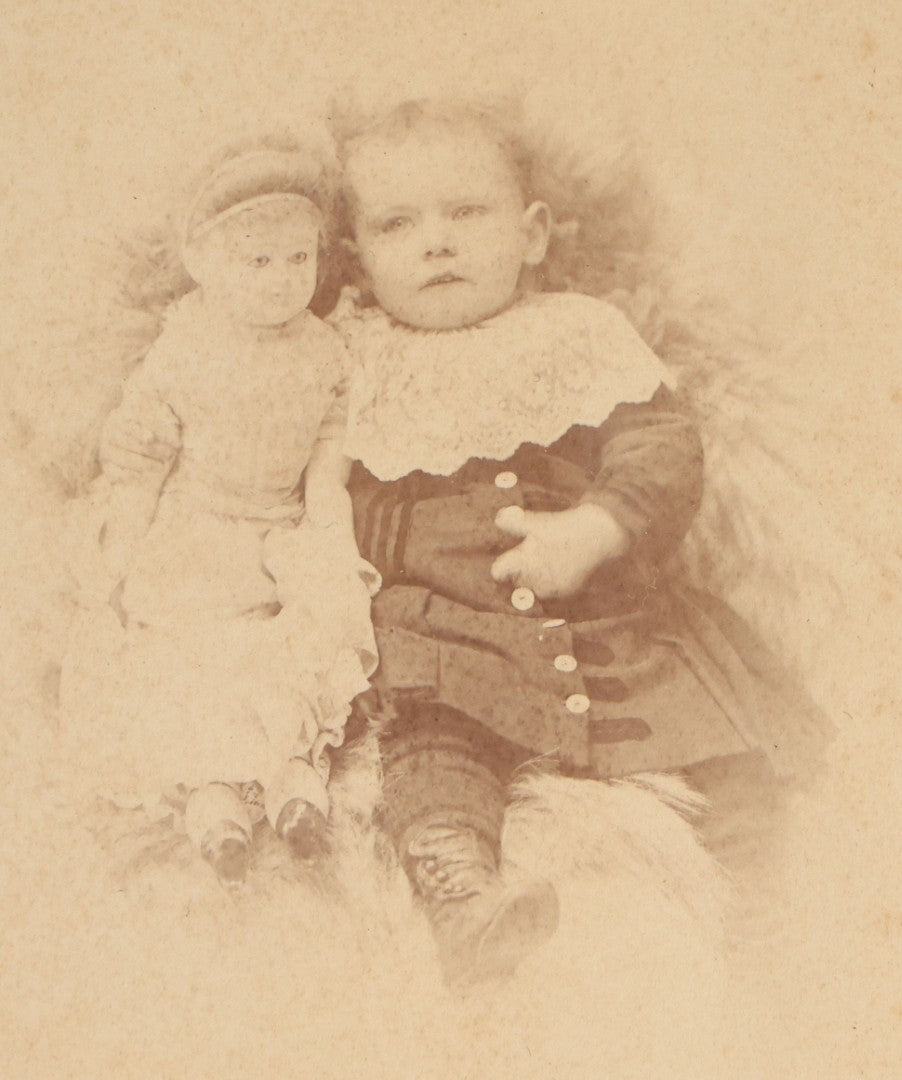 Lot 088 - Antique Cabinet Card Photograph Of A Young Boy With A Doll, Photographed By Corse, Montpelier, Vermont