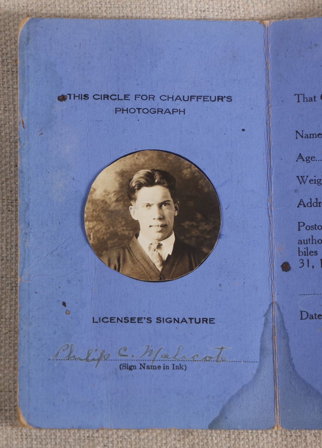 Lot 092 - Vintage 1927 Indiana Chauffeur's License With Circle-Cut Photograph Of Philip C. Malcote, Facsimile Signature Of F. E. Schortemeier, Secretary Of State