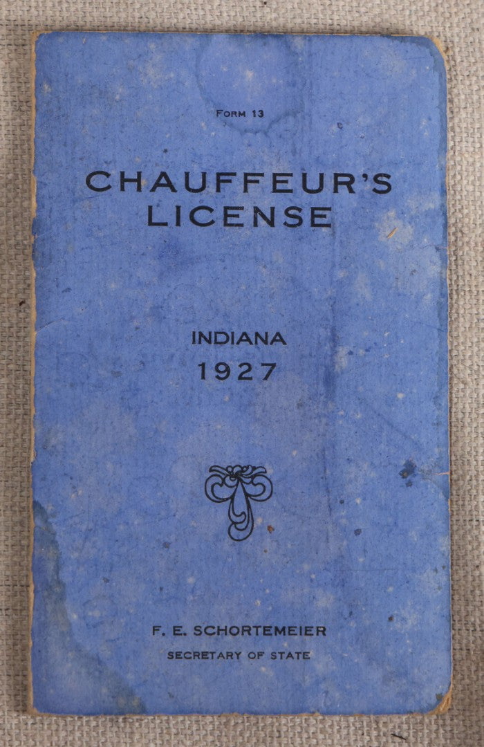Lot 092 - Vintage 1927 Indiana Chauffeur's License With Circle-Cut Photograph Of Philip C. Malcote, Facsimile Signature Of F. E. Schortemeier, Secretary Of State