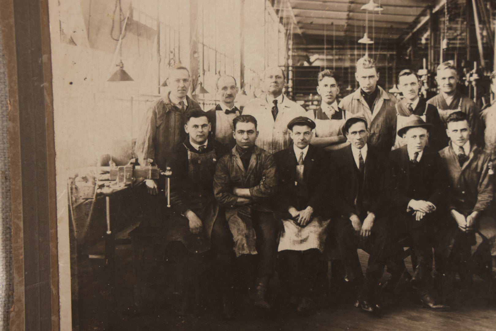 Lot 094 - Antique Board-Mounted Occupational Photograph Of Factory Workers In An Industrial Workshop