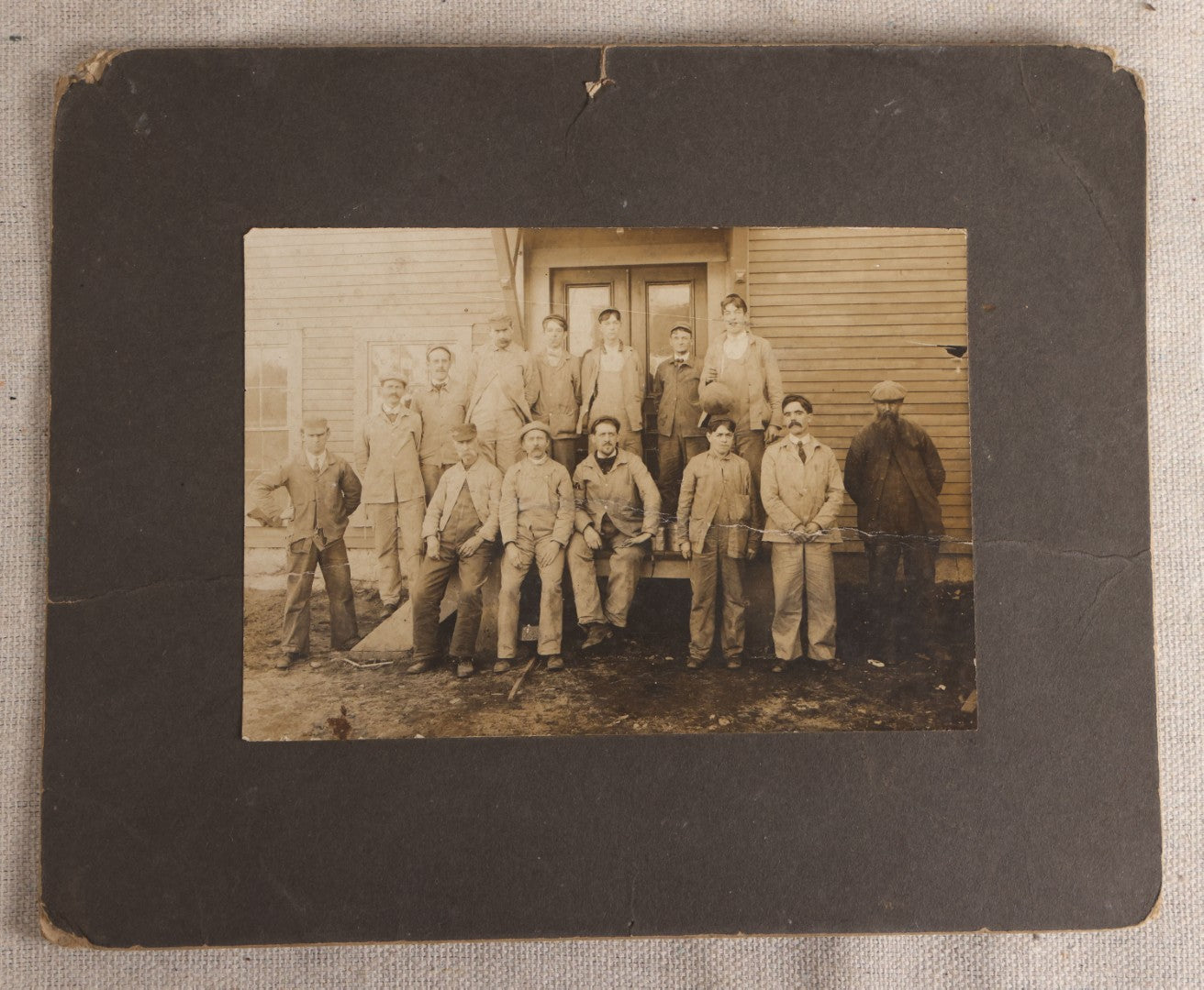 Lot 095 - Antique Board-Mounted Occupational Photograph Of A Group Of Workers Outside A Clapboard Building