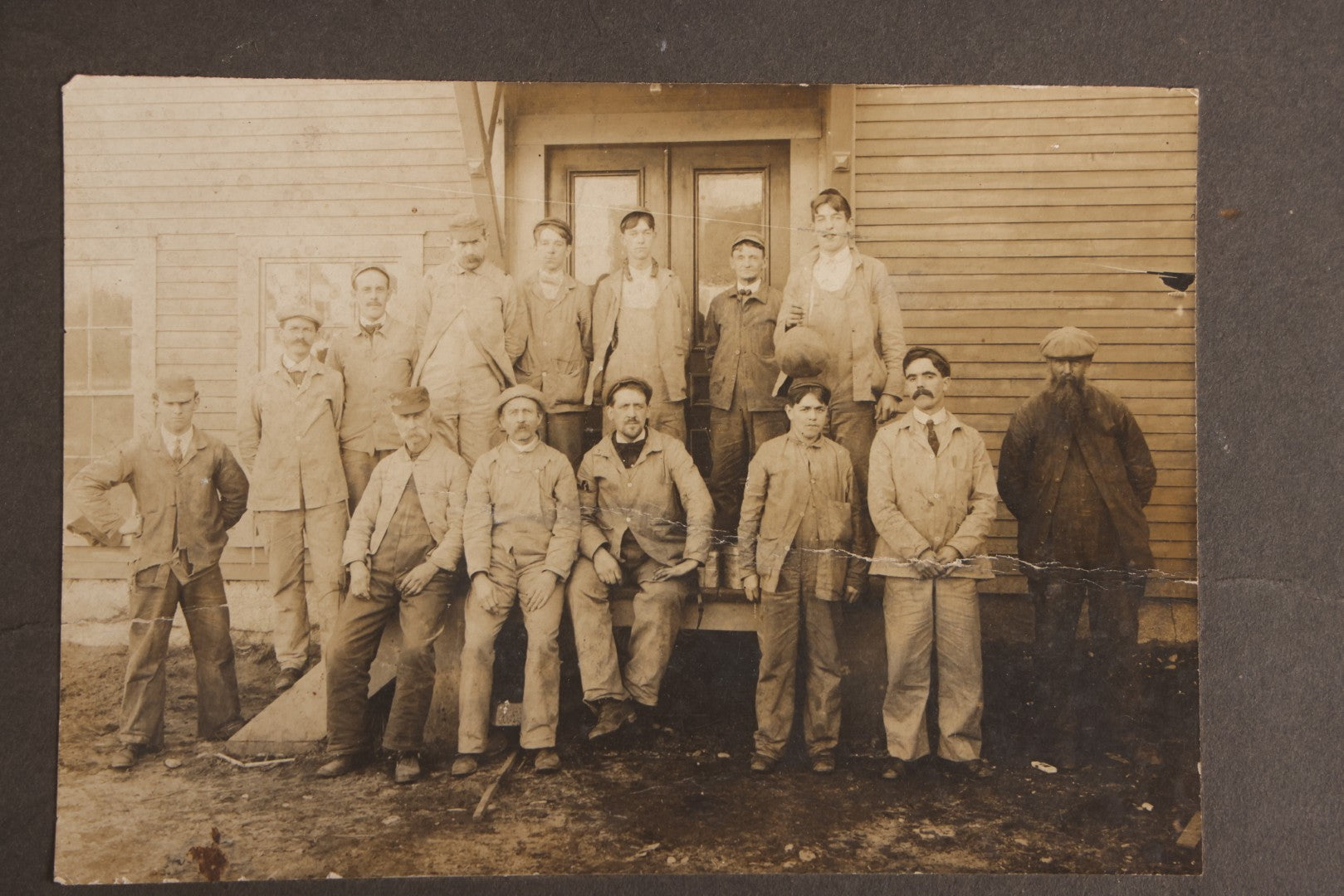 Lot 095 - Antique Board-Mounted Occupational Photograph Of A Group Of Workers Outside A Clapboard Building