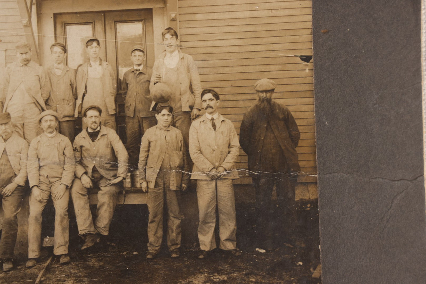 Lot 095 - Antique Board-Mounted Occupational Photograph Of A Group Of Workers Outside A Clapboard Building