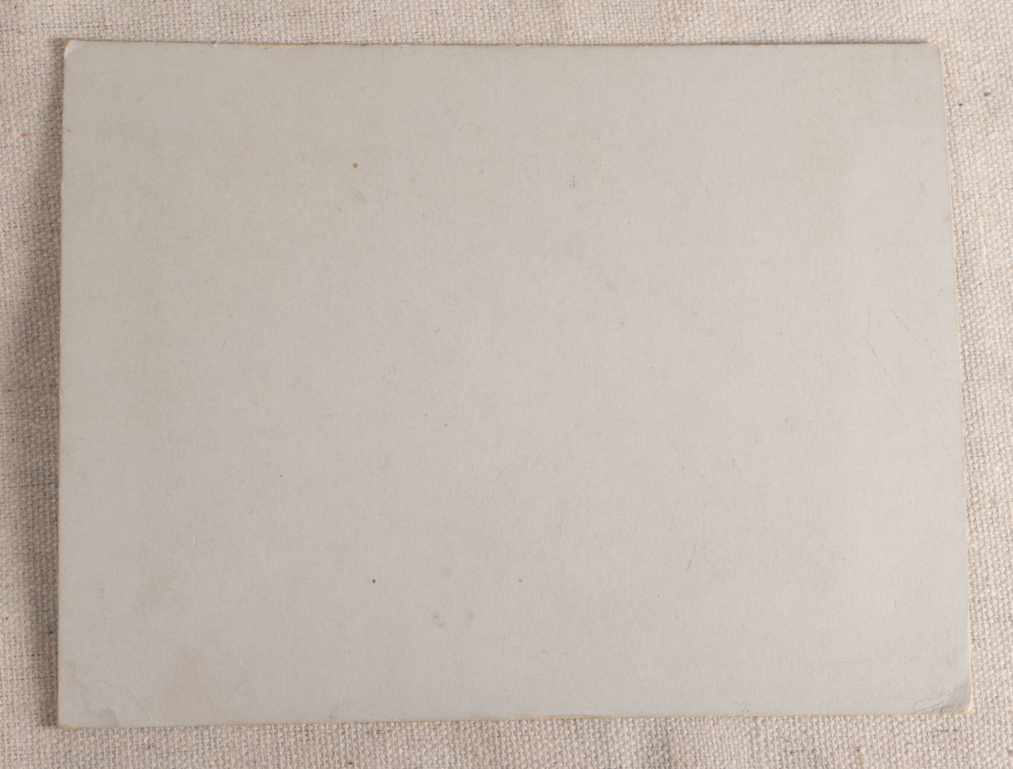Lot 096 - Antique Board-Mounted Photograph Of A Group Of Men In A Tropical Setting With A Dog