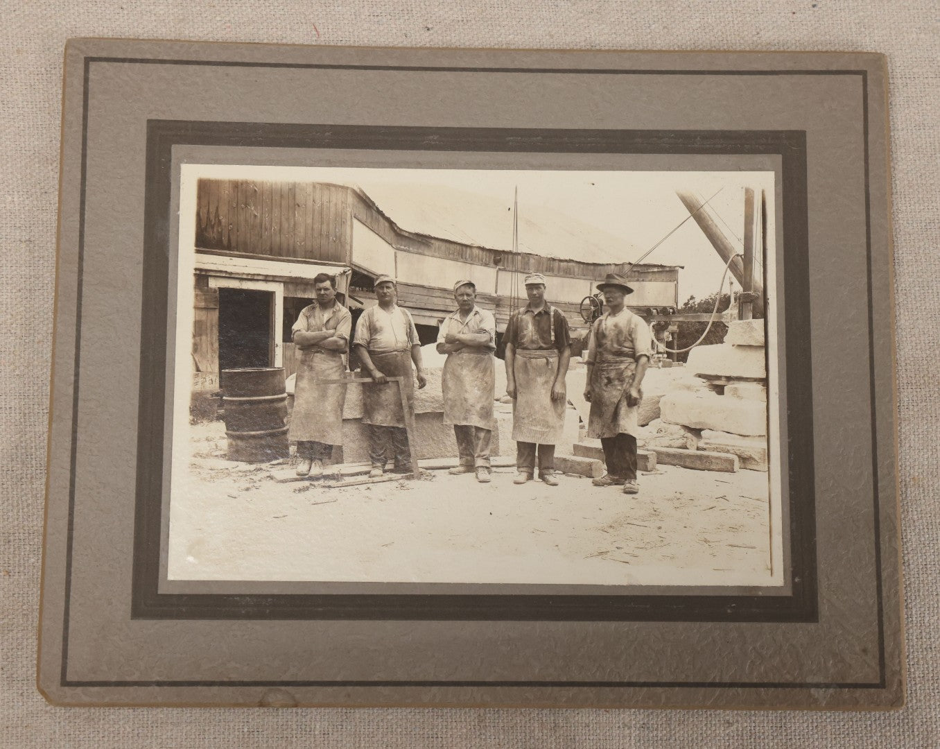 Lot 098 - Antique Board-Mounted Occupational Photograph Of Five Quarry Workers In Aprons, Inscribed Concord, New Hampshire Quarry
