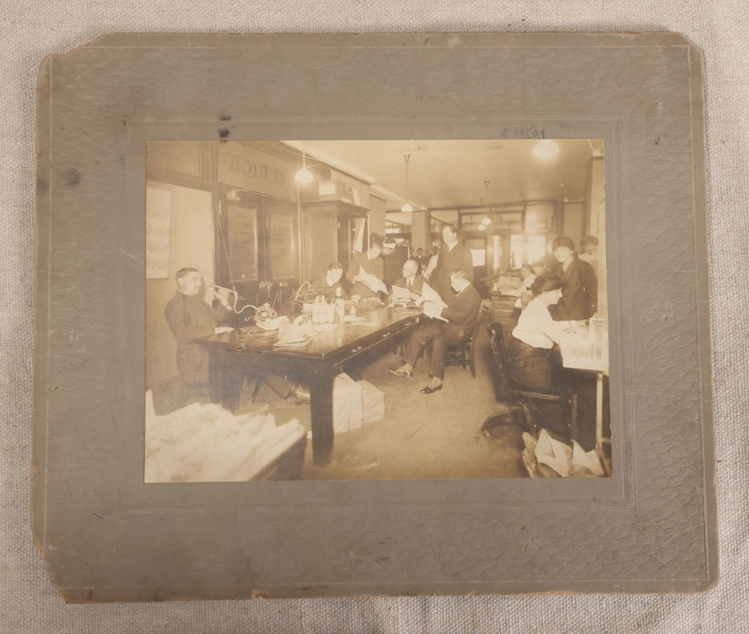 Lot 100 - Antique Board-Mounted Occupational Photograph Of An Office Interior With Wax Cylinder Dictating Machines, Zurich Insurance Sign On Door