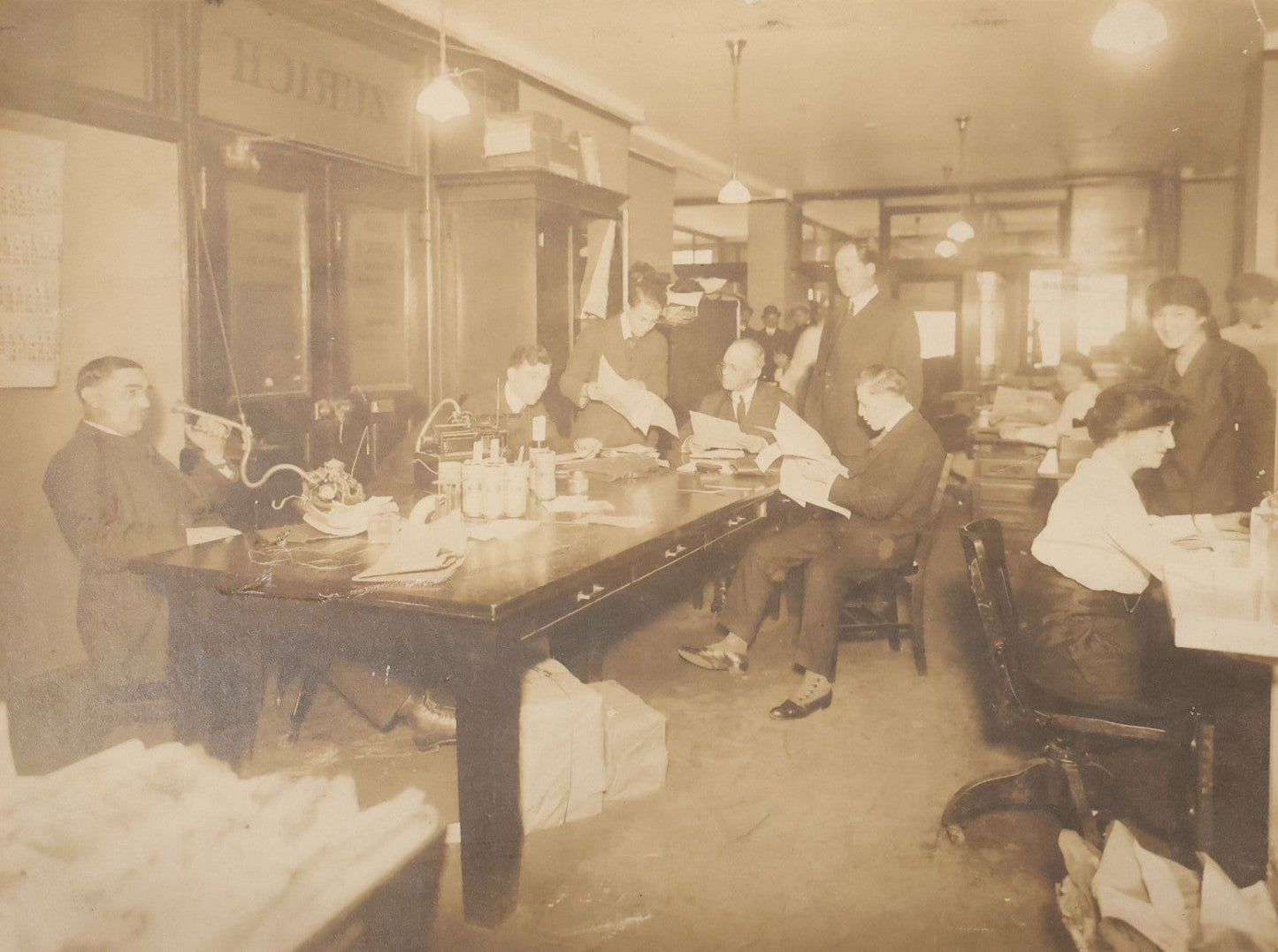 Lot 100 - Antique Board-Mounted Occupational Photograph Of An Office Interior With Wax Cylinder Dictating Machines, Zurich Insurance Sign On Door