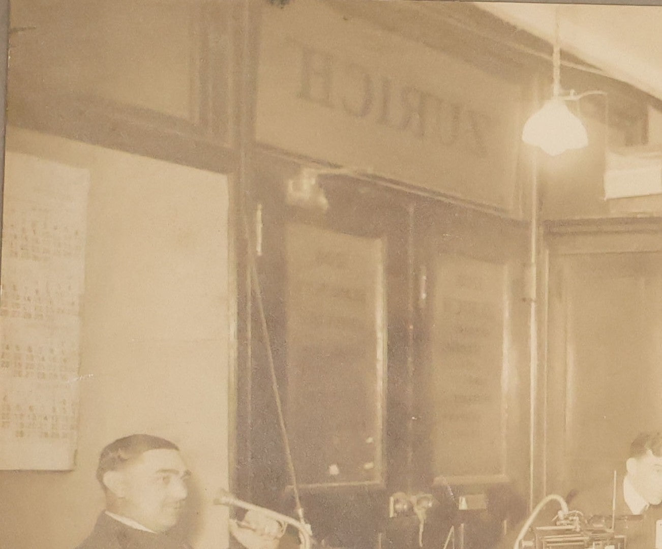 Lot 100 - Antique Board-Mounted Occupational Photograph Of An Office Interior With Wax Cylinder Dictating Machines, Zurich Insurance Sign On Door