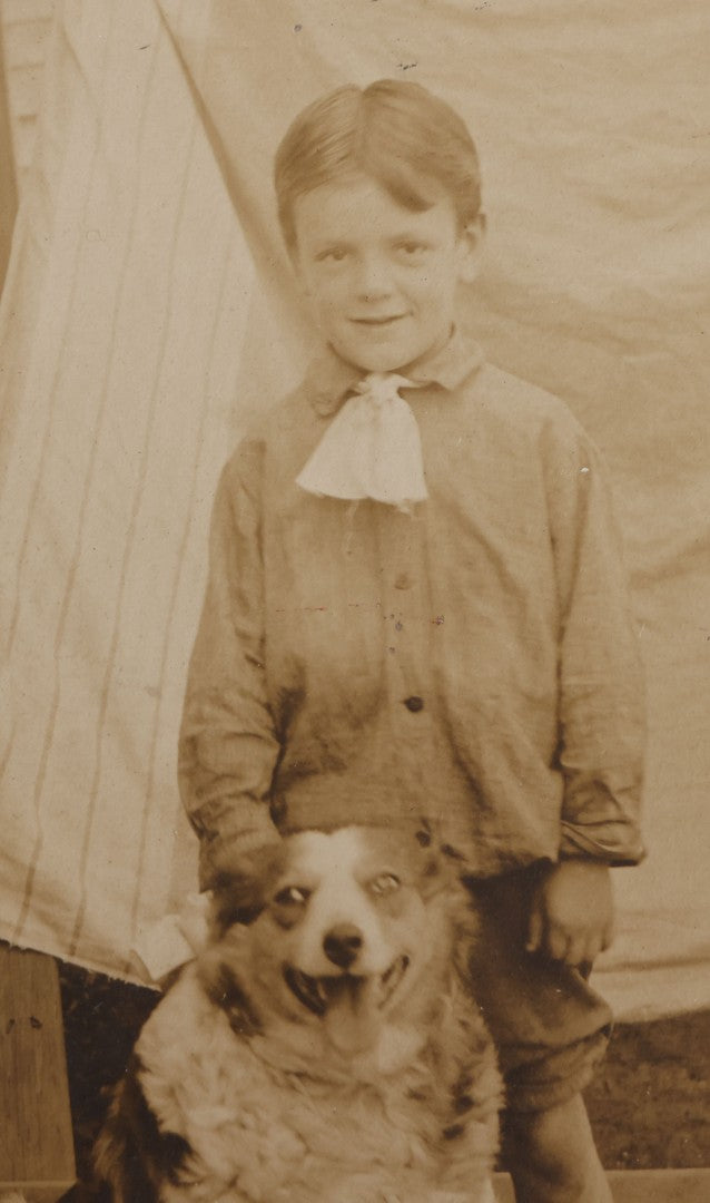 Lot 103 - Antique Board-Mounted Photograph Of A Barefoot Boy With A Dog