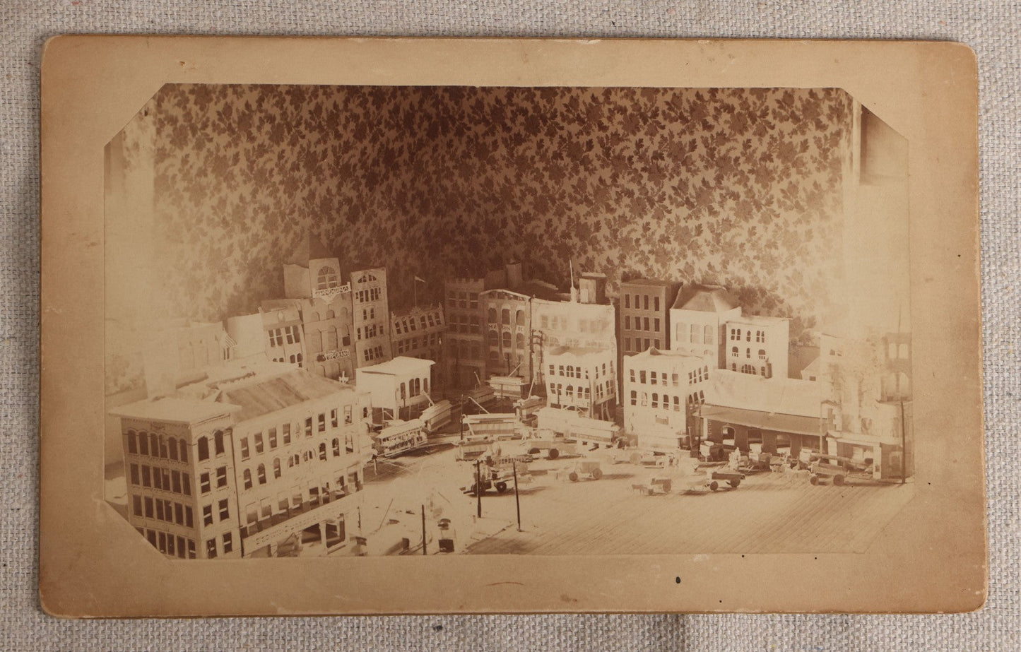 Lot 106 - Pair Of Antique Boudoir-Size Cabinet Card Photographs Of A Handmade Miniature Model City With "South Newton" Trolley, "The Grand" Theater, Masonic Lodge, And "United States Brewing Co." Building, Snow & McDermott, Cambridge, Massachusetts