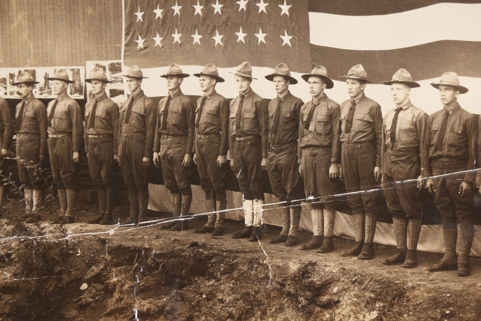 Lot 109 - Antique Board-Mounted Photograph Of World War I Soldiers In Formation Before A Large American Flag, Photographed By Kinsey Photo, Seattle