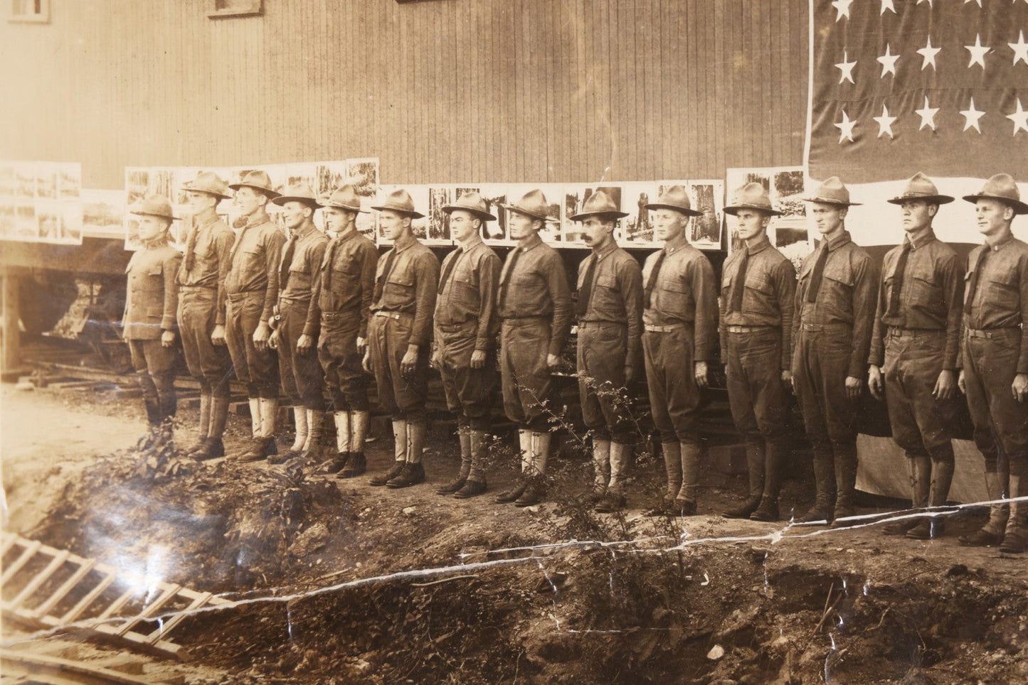 Lot 109 - Antique Board-Mounted Photograph Of World War I Soldiers In Formation Before A Large American Flag, Photographed By Kinsey Photo, Seattle