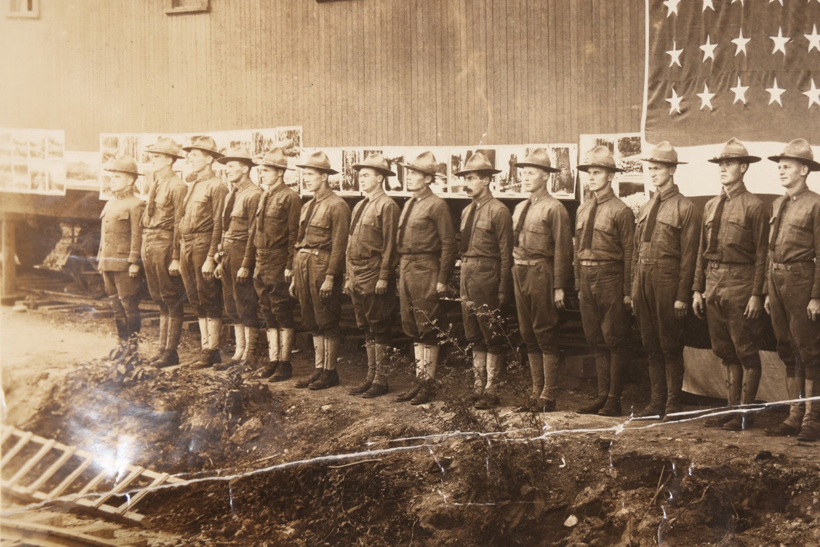 Lot 109 - Antique Board-Mounted Photograph Of World War I Soldiers In Formation Before A Large American Flag, Photographed By Kinsey Photo, Seattle