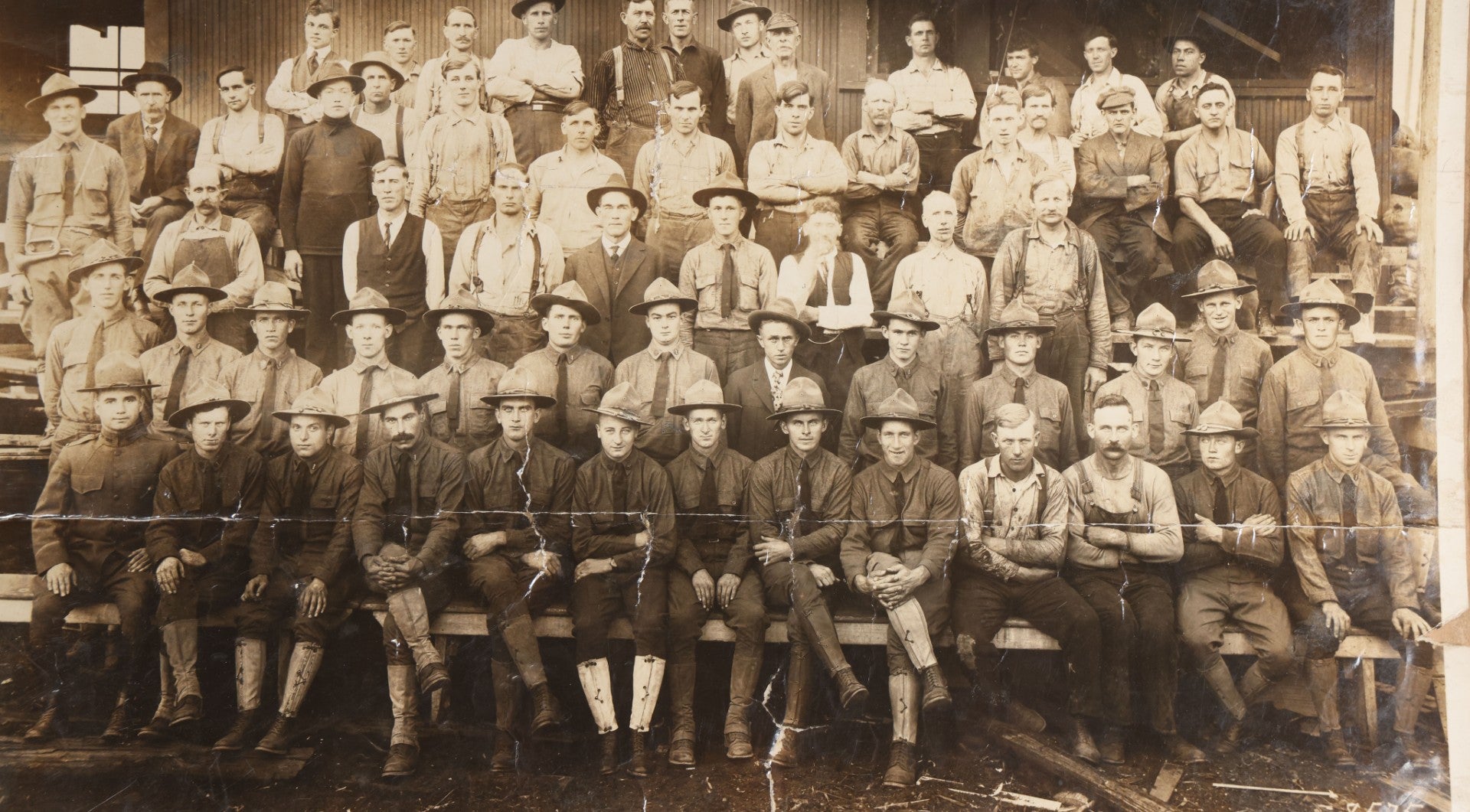 Lot 110 - Antique Board-Mounted 1918 Photograph Of World War I Soldiers And Workers, Photographed By Kinsey Photo, Seattle