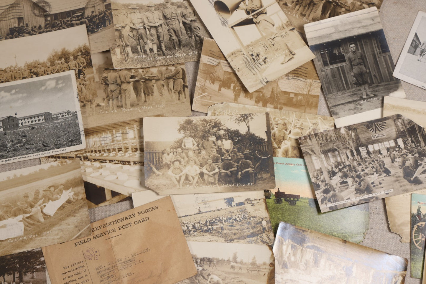Lot 111 - Grouping Of 25 World War I Era Postcards, Mostly R.P.P.C.., From George F.A. Mulcahy, Including Training Scenes At Plattsburgh And Camp Devens, Barracks Interior, Rifle Training, Map Reading, And Marching