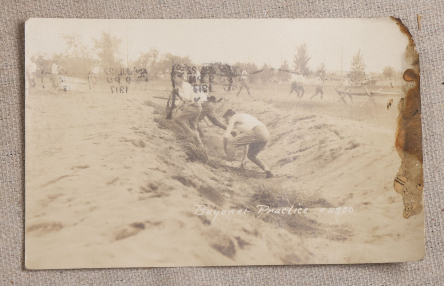 Lot 111 - Grouping Of 25 World War I Era Postcards, Mostly R.P.P.C.., From George F.A. Mulcahy, Including Training Scenes At Plattsburgh And Camp Devens, Barracks Interior, Rifle Training, Map Reading, And Marching