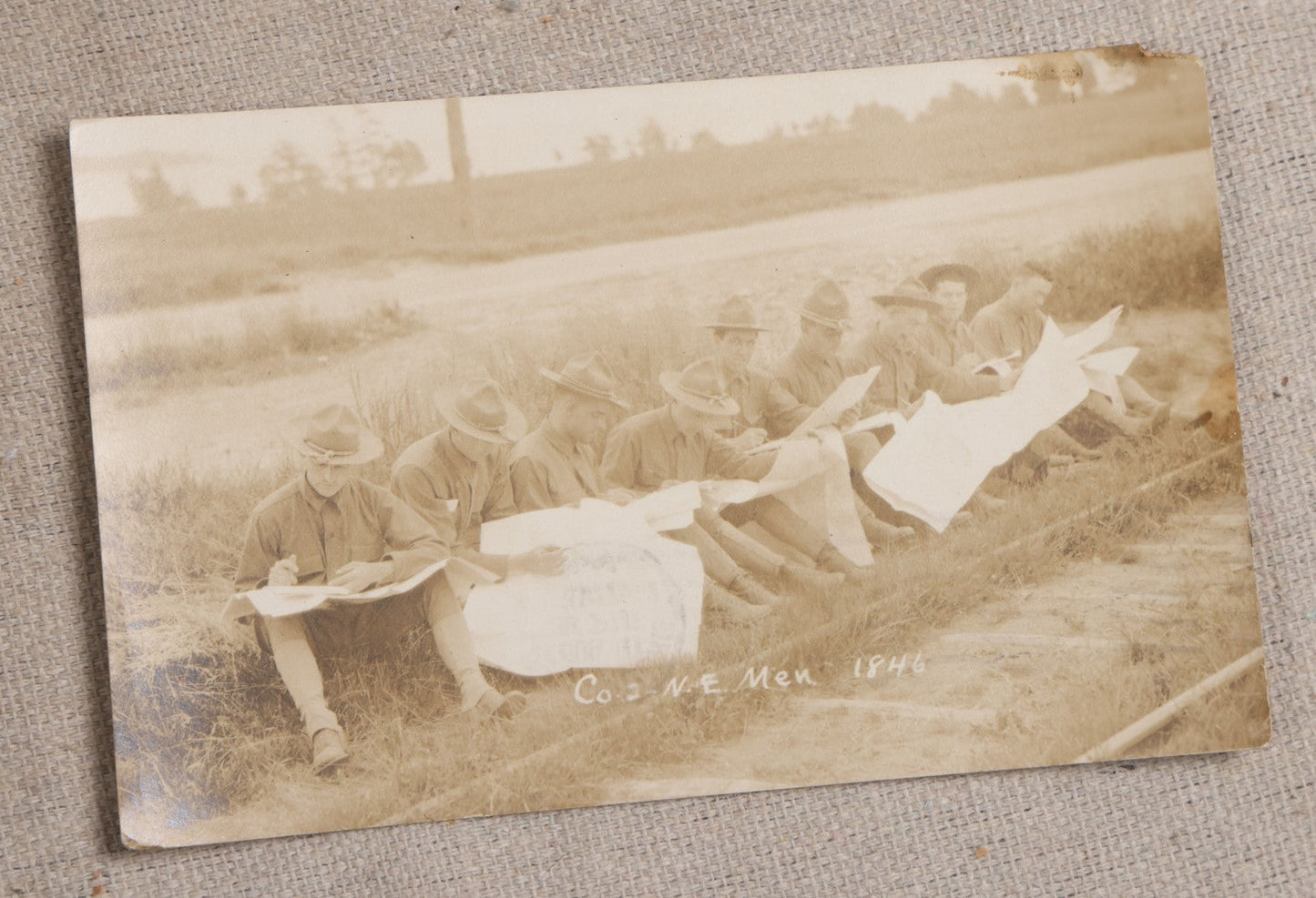 Lot 111 - Grouping Of 25 World War I Era Postcards, Mostly R.P.P.C.., From George F.A. Mulcahy, Including Training Scenes At Plattsburgh And Camp Devens, Barracks Interior, Rifle Training, Map Reading, And Marching