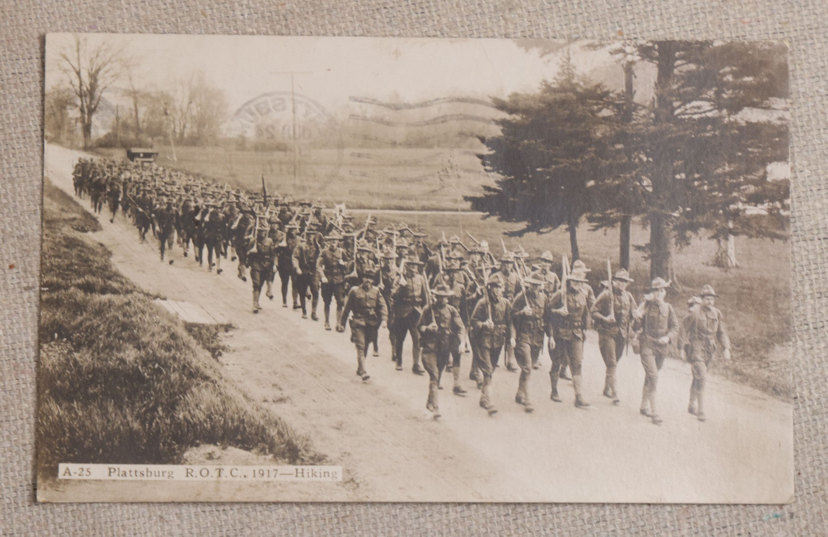 Lot 111 - Grouping Of 25 World War I Era Postcards, Mostly R.P.P.C.., From George F.A. Mulcahy, Including Training Scenes At Plattsburgh And Camp Devens, Barracks Interior, Rifle Training, Map Reading, And Marching