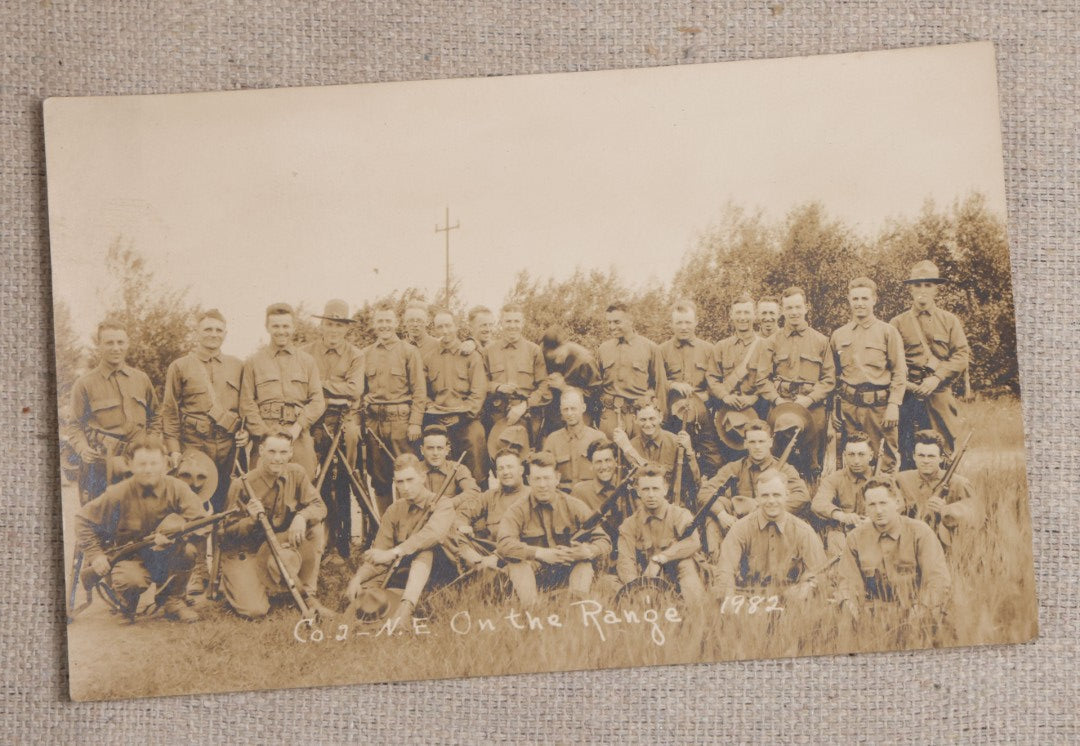 Lot 111 - Grouping Of 25 World War I Era Postcards, Mostly R.P.P.C.., From George F.A. Mulcahy, Including Training Scenes At Plattsburgh And Camp Devens, Barracks Interior, Rifle Training, Map Reading, And Marching