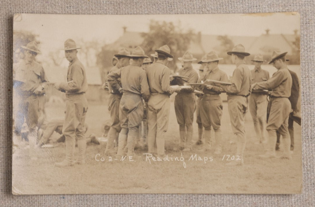 Lot 111 - Grouping Of 25 World War I Era Postcards, Mostly R.P.P.C.., From George F.A. Mulcahy, Including Training Scenes At Plattsburgh And Camp Devens, Barracks Interior, Rifle Training, Map Reading, And Marching
