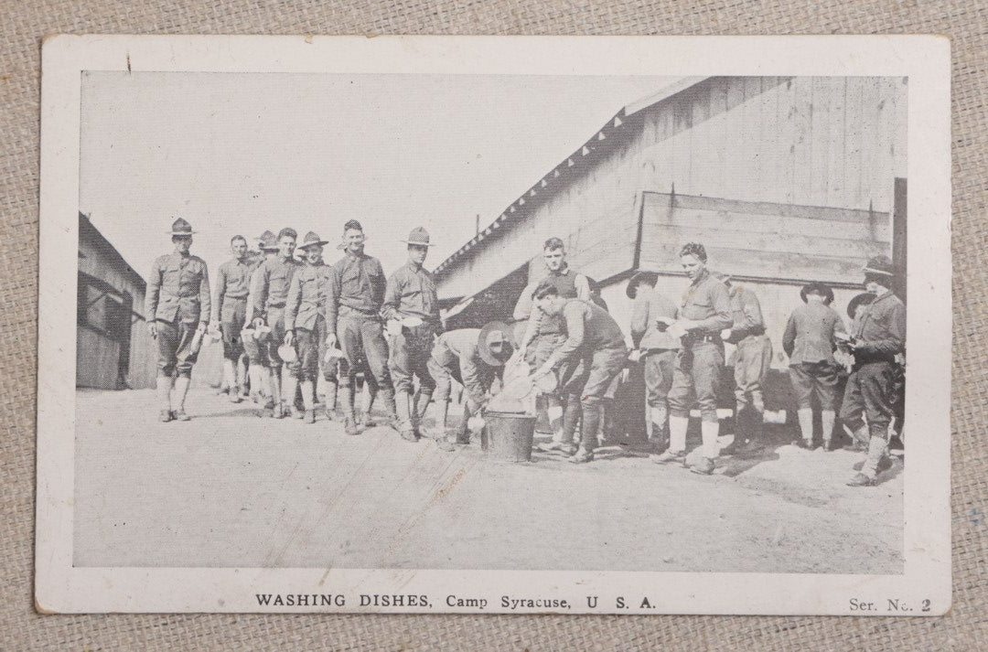 Lot 111 - Grouping Of 25 World War I Era Postcards, Mostly R.P.P.C.., From George F.A. Mulcahy, Including Training Scenes At Plattsburgh And Camp Devens, Barracks Interior, Rifle Training, Map Reading, And Marching