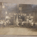 Lot 114 - Antique Unmounted Photograph Of A Schoolroom Interior With Young Children, Pot-Belly Stove, And Fireplace