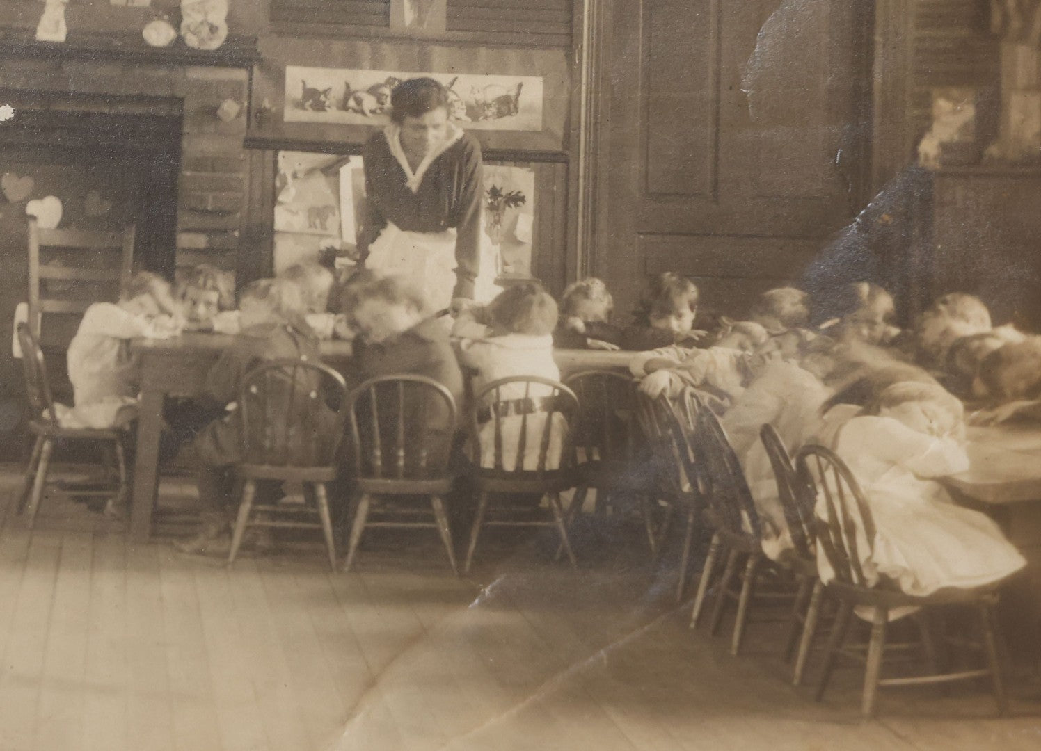 Lot 114 - Antique Unmounted Photograph Of A Schoolroom Interior With Young Children, Pot-Belly Stove, And Fireplace