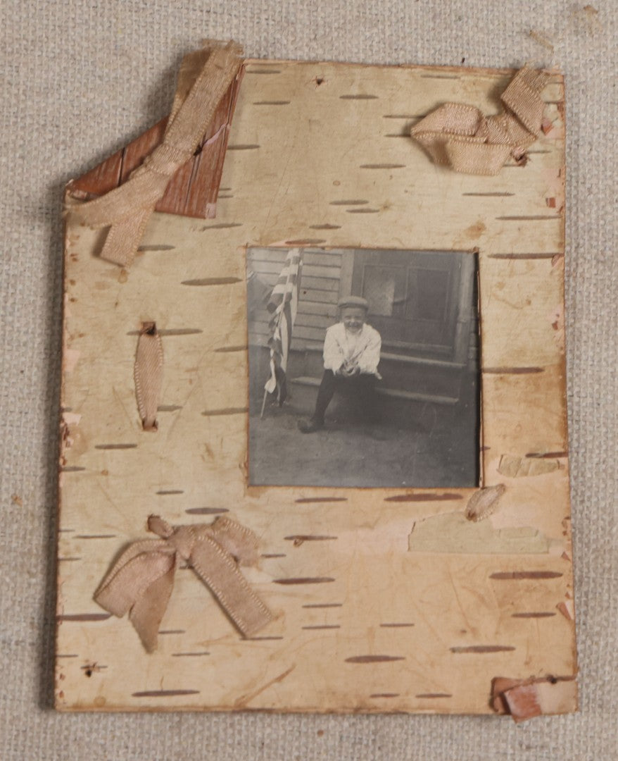 Lot 115 - Grouping Of Six Antique Board-Mounted Photographs Of Children, Including American Flag, Pet Bunnies, Pet Chickens, Doll In Pram, And Winter Sled Scene