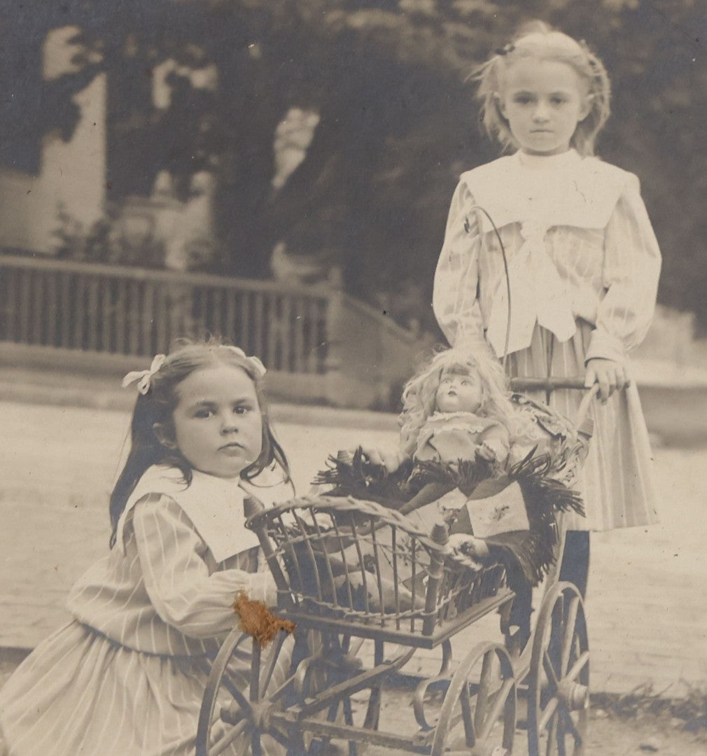 Lot 115 - Grouping Of Six Antique Board-Mounted Photographs Of Children, Including American Flag, Pet Bunnies, Pet Chickens, Doll In Pram, And Winter Sled Scene