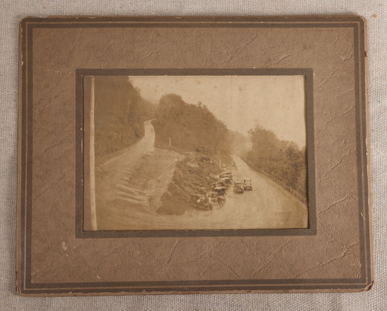 Lot 120 - Antique Foldered Photograph Of The Hairpin Turn On The Mohawk Trail, Massachusetts, July 22, 1925, With Eight Early Automobiles