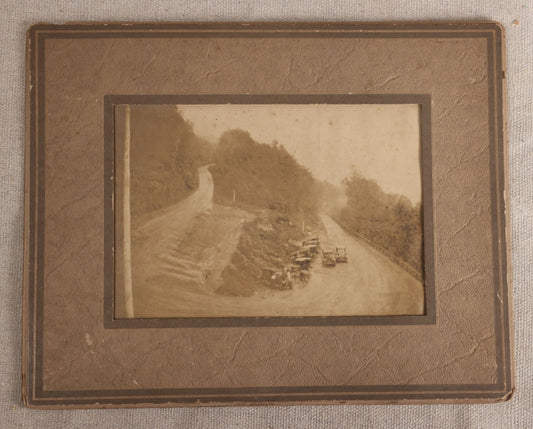 Lot 120 - Antique Foldered Photograph Of The Hairpin Turn On The Mohawk Trail, Massachusetts, July 22, 1925, With Eight Early Automobiles