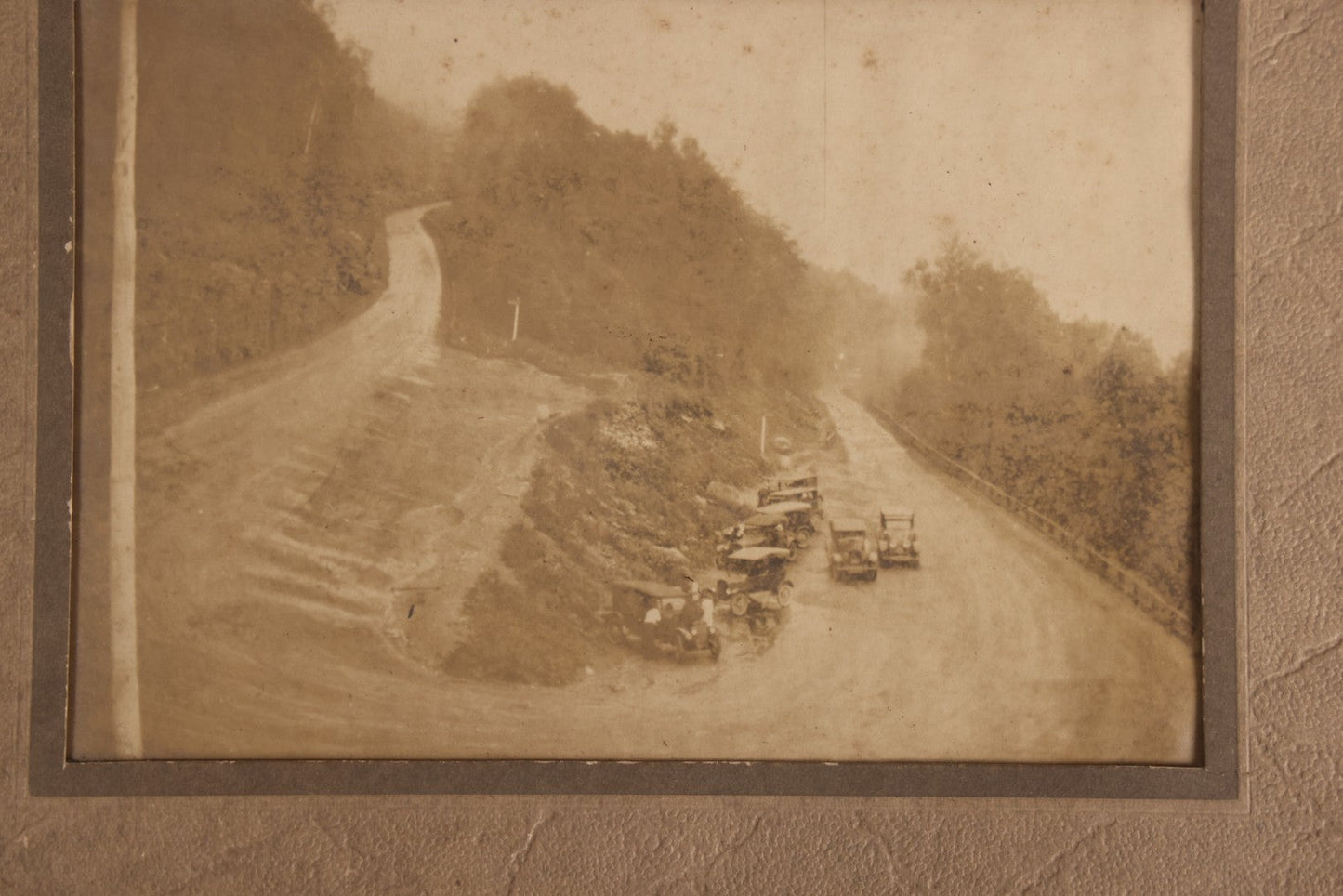Lot 120 - Antique Foldered Photograph Of The Hairpin Turn On The Mohawk Trail, Massachusetts, July 22, 1925, With Eight Early Automobiles