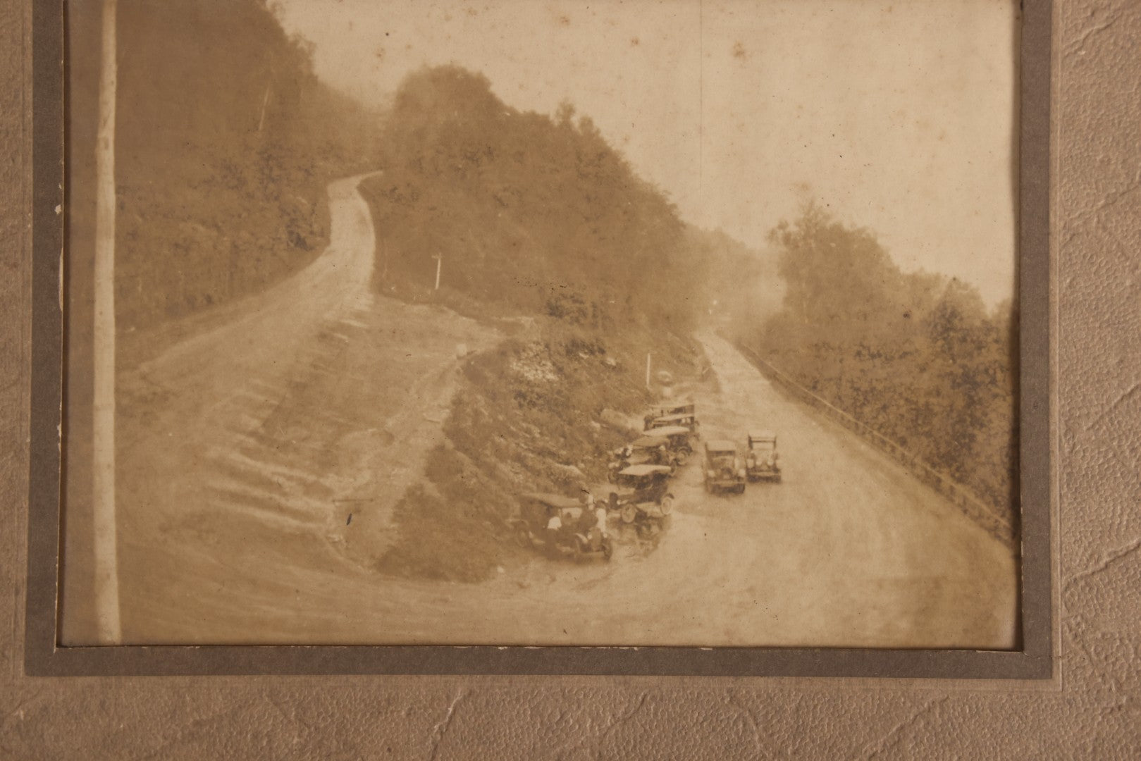 Lot 120 - Antique Foldered Photograph Of The Hairpin Turn On The Mohawk Trail, Massachusetts, July 22, 1925, With Eight Early Automobiles